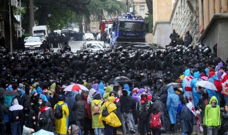 Georgia: &#039;We will not give up&#039; - protesters and police in tense standoff on streets of Tbilisi