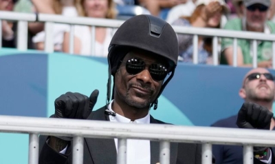 Olympics superfan Snoop Dogg sports full equestrian kit to watch dressage