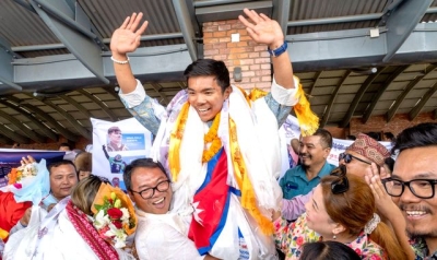 Hero&#039;s welcome for record-breaking Nepal teenager after climbing world&#039;s highest peaks