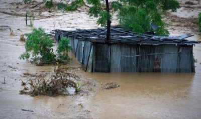 Flooding in Nepal kills at least 100 as swollen rivers pour through Kathmandu