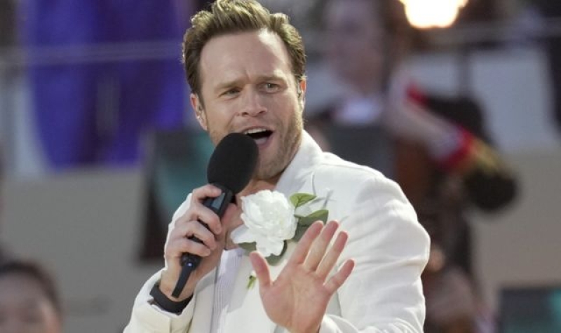 Olly Murs apologises for cancelling Glasgow gig with Take That after flight woes