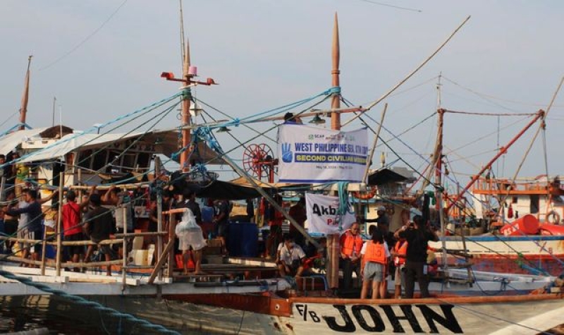 Philippine ships deployed to watch activists sail to disputed Scarborough Shoal fishing area as China tensions grow