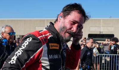 Keanu Reeves, who starred in Speed and The Matrix, spins off the track on professional racing debut in Indianapolis