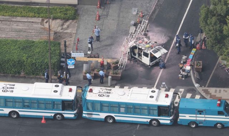 Man arrested after firebombs thrown at Japan&#039;s ruling party HQ and car driven into security fence around PM&#039;s office