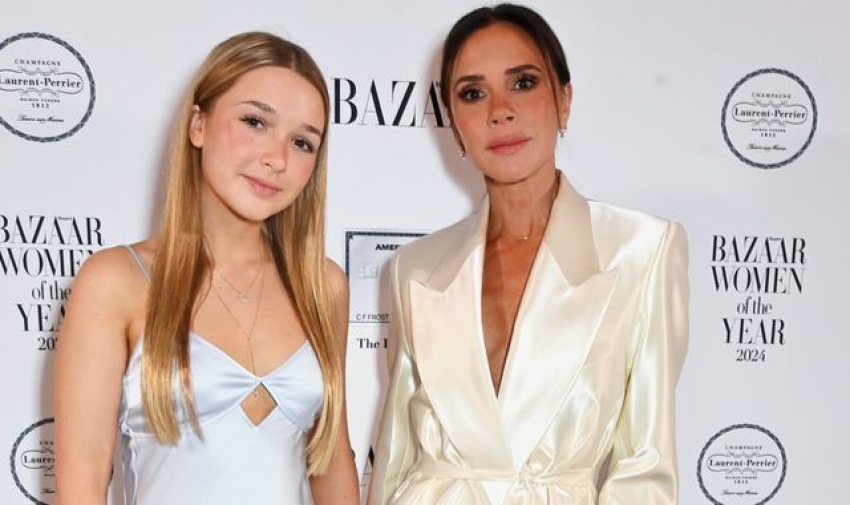 Harper Beckham presents mum Victoria with a Harper's Bazaar women of the year prize