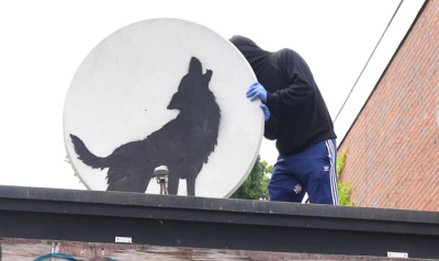 New Banksy artwork in Peckham taken away by masked people within hours of being unveiled