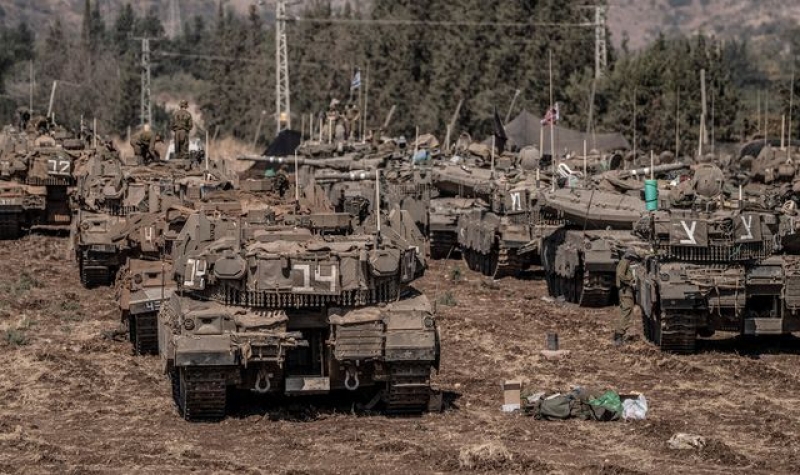 Tanks gather near Israeli-Lebanon border - as defence minister holds talks over &#039;expansion&#039; of IDF activity 